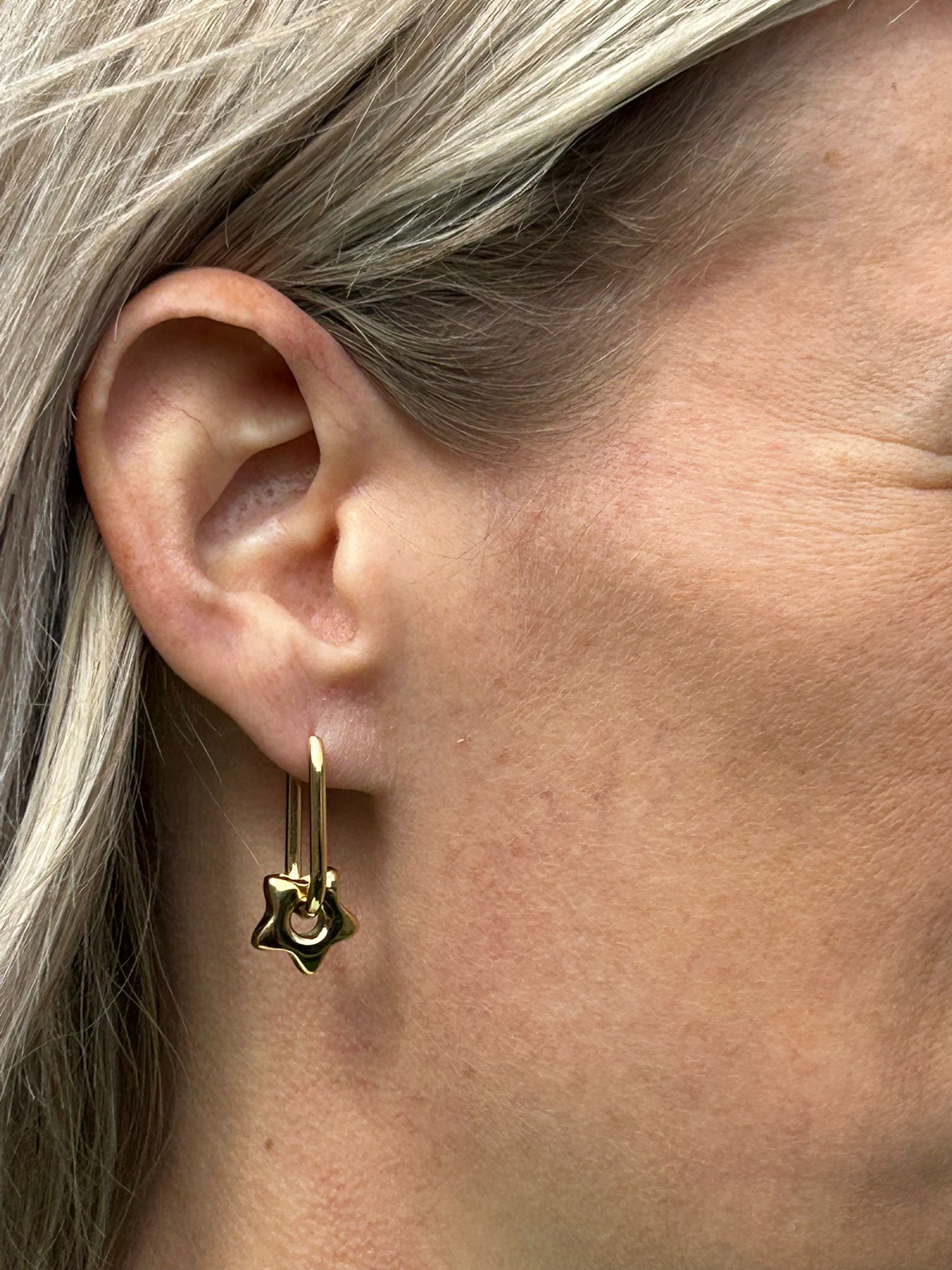 Oorbellen Sterren goud sterren hangers dames | Coco & Co