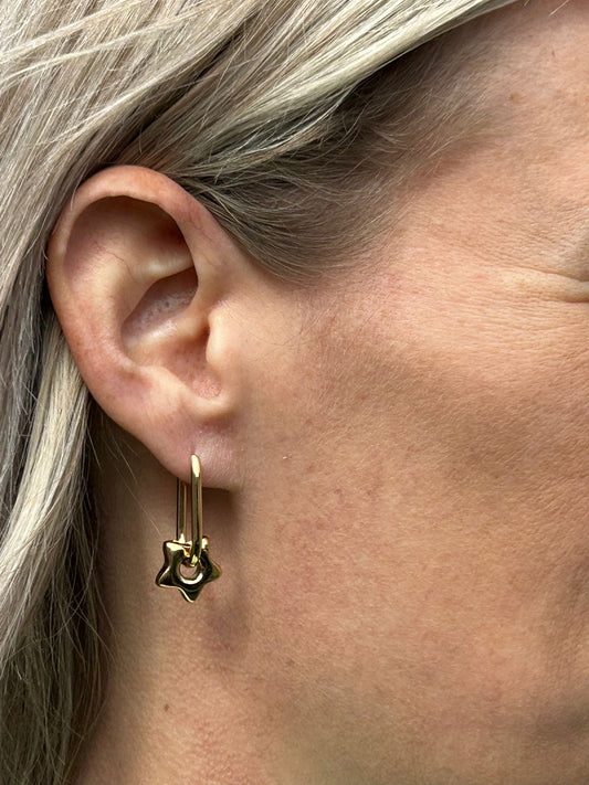 Oorbellen Sterren goud sterren hangers dames | Coco & Co